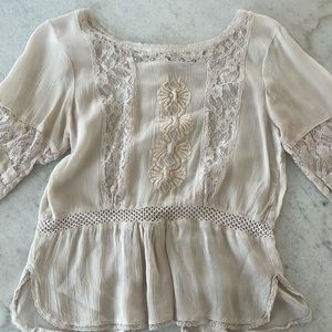 Blush colored blouse by Ganni